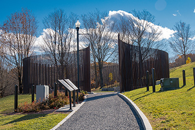 Statues with Flags in Background from Korean War Memorial