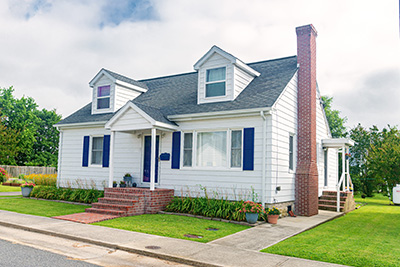 White Houses with Blue Shutters in a Neighborhood