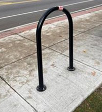 Inverted U Style Bike Rack on Sidewalk