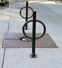 Post-and-Hitch Style Bike Rack on Sidewalk