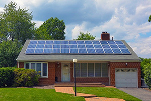 Residential Brick House with Solar Panels on Roof